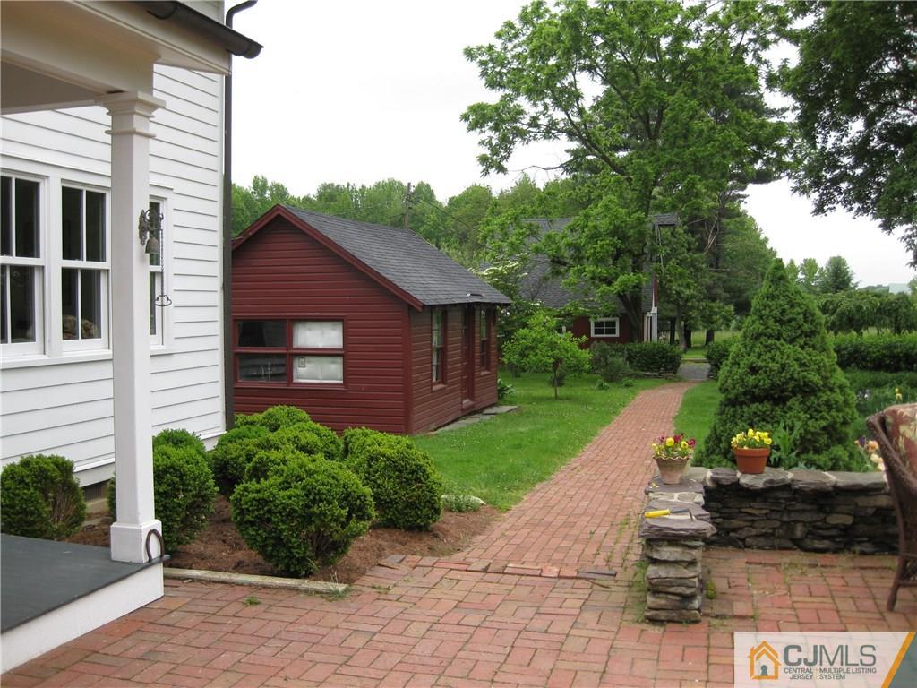 168 Plainsboro Road Cranbury, NJ 08512 - Photo 24 of 25 a view of a back yard of the house