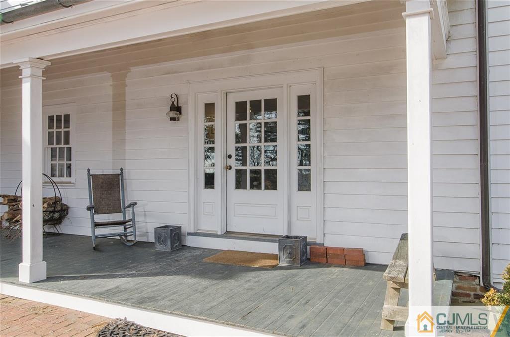 168 Plainsboro Road Cranbury, NJ 08512 - Photo 4 of 25 a view of a building with outdoor space