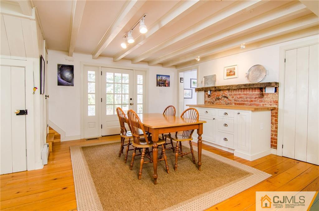 168 Plainsboro Road Cranbury, NJ 08512 - Photo 7 of 25 a view of a dining room with furniture
