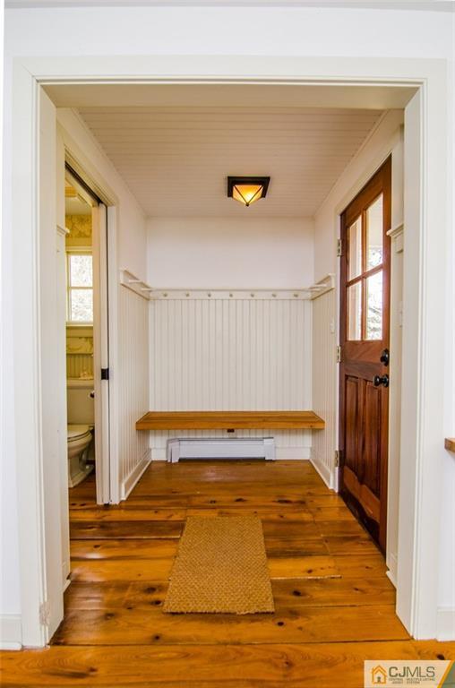 168 Plainsboro Road Cranbury, NJ 08512 - Photo 9 of 25 a view of a room with wooden floor and windows