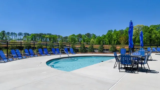 a view of a chairs and tables in the patio