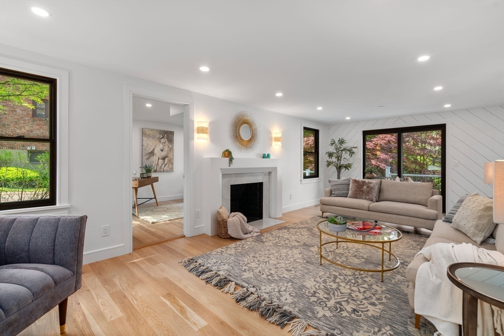 11 Ashford Road Newton, MA 02459 - Photo 13 of 41 a living room with furniture large window and a fireplace