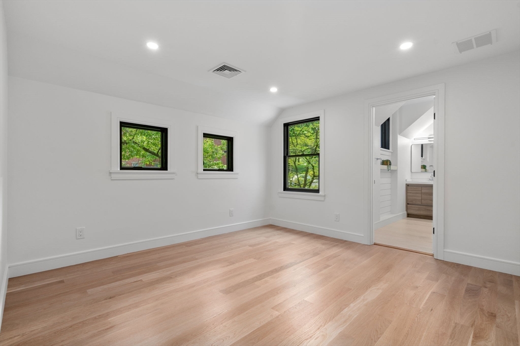 11 Ashford Road Newton, MA 02459 - Photo 21 of 41 an empty room with windows and closet