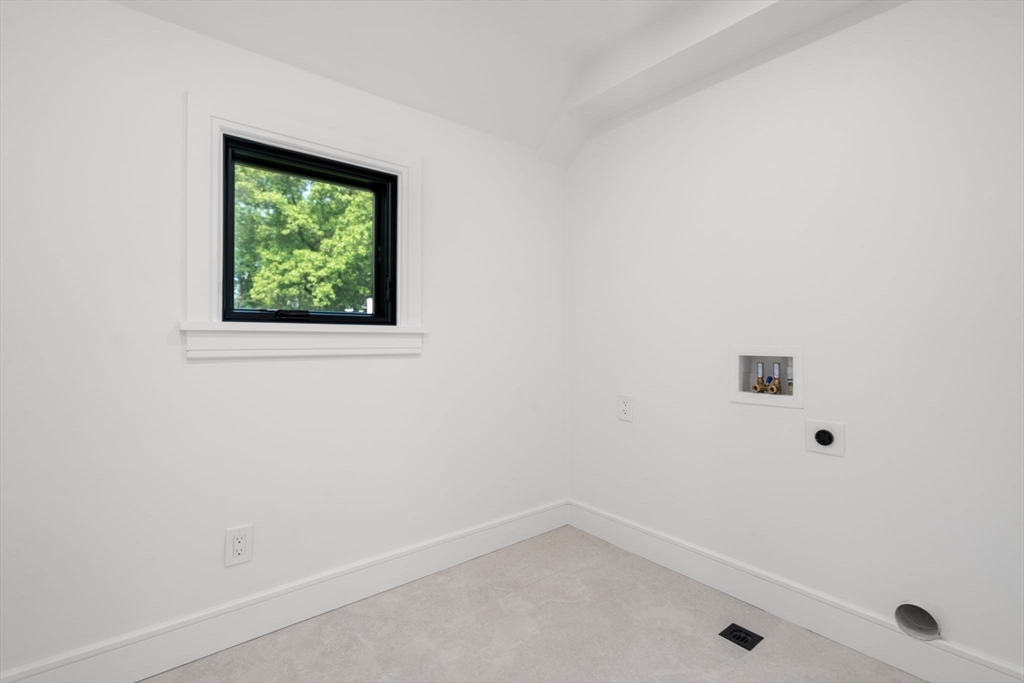 11 Ashford Road Newton, MA 02459 - Photo 29 of 41 an empty room with a window