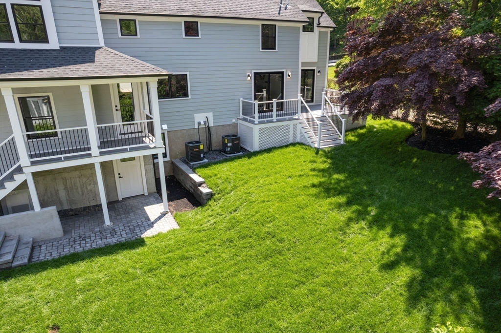 11 Ashford Road Newton, MA 02459 - Photo 36 of 41 a view of an house with backyard space and sitting area