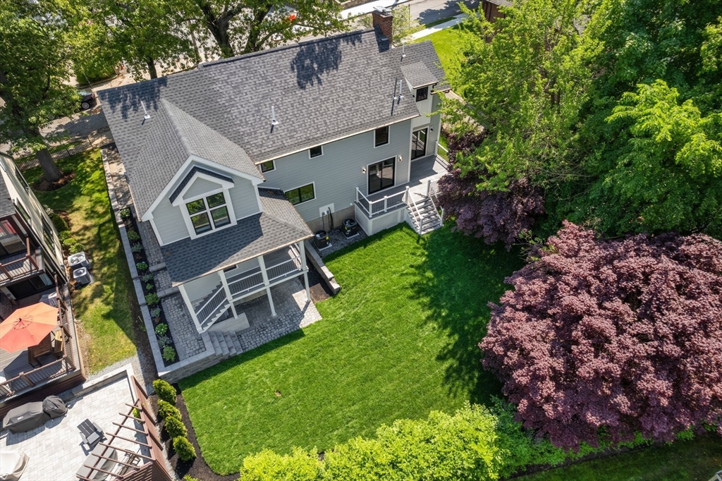 11 Ashford Road Newton, MA 02459 - Photo 37 of 41 a aerial view of a house with a garden