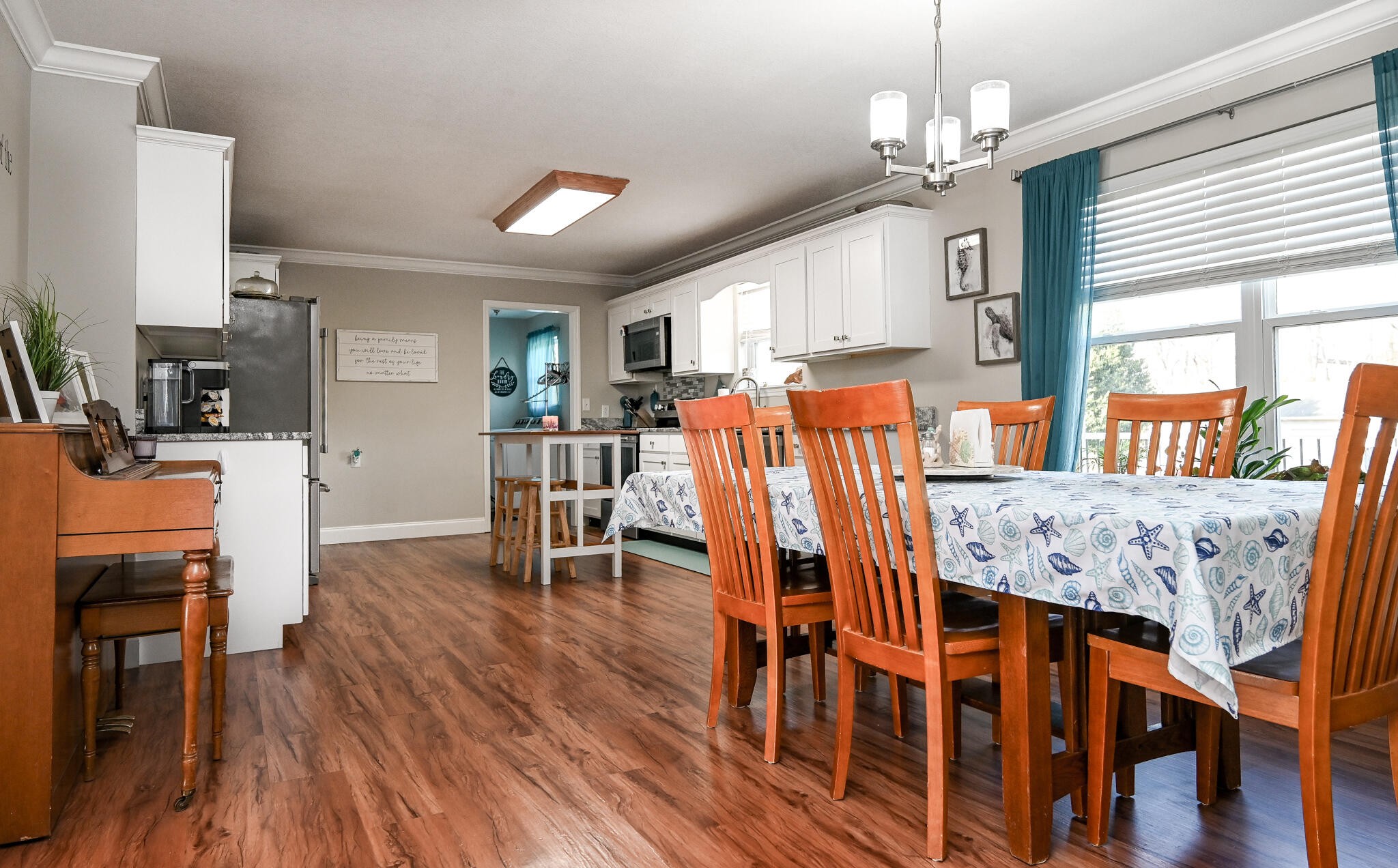 276 Mason Road McDonald, TN 37353 - Photo 18 of 67 a view of a dining room with furniture and wooden floor