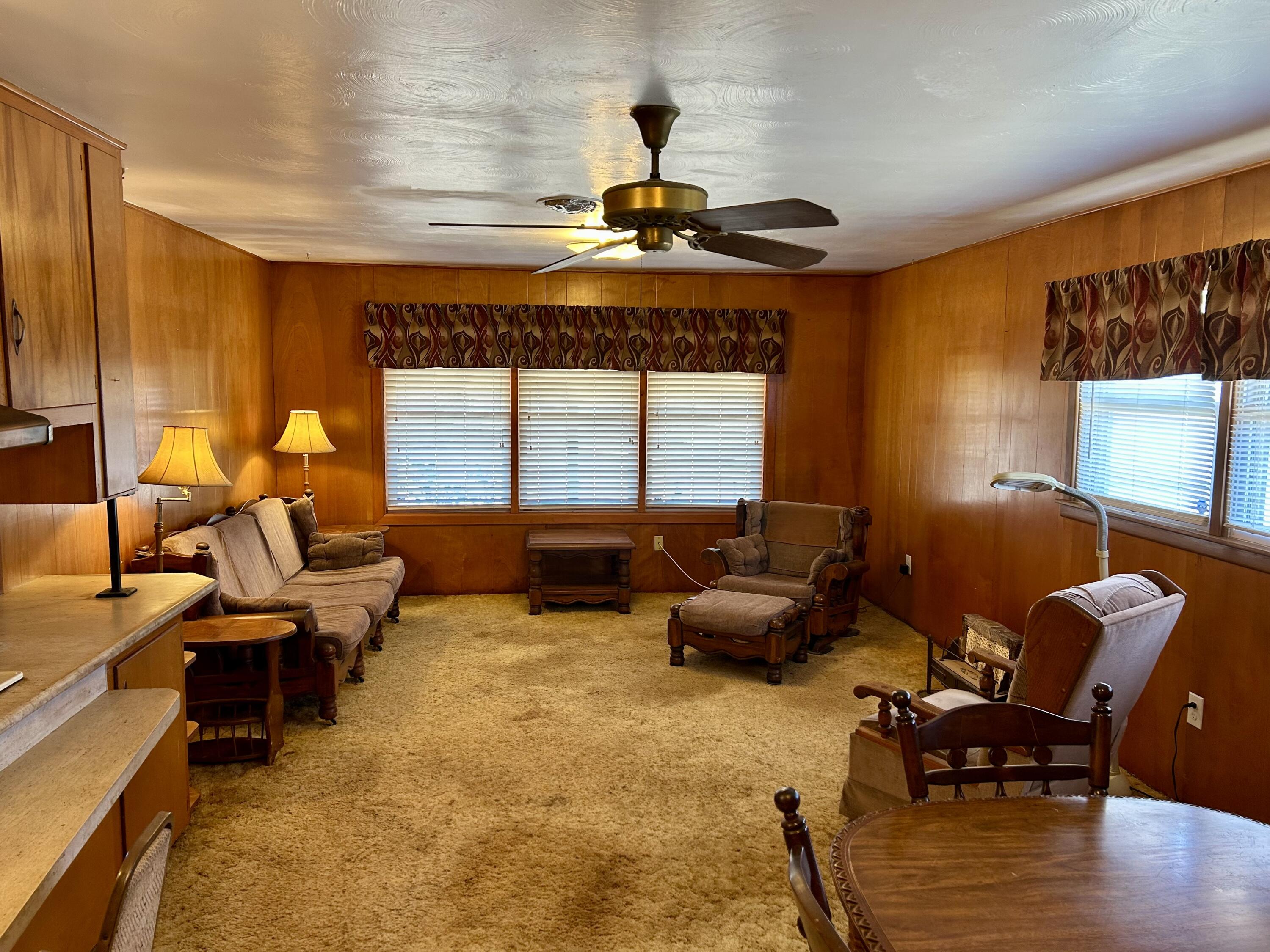2101 Farm To Market 97 Lockney, TX 79241 - Photo 8 of 35 a living room with furniture and a large window