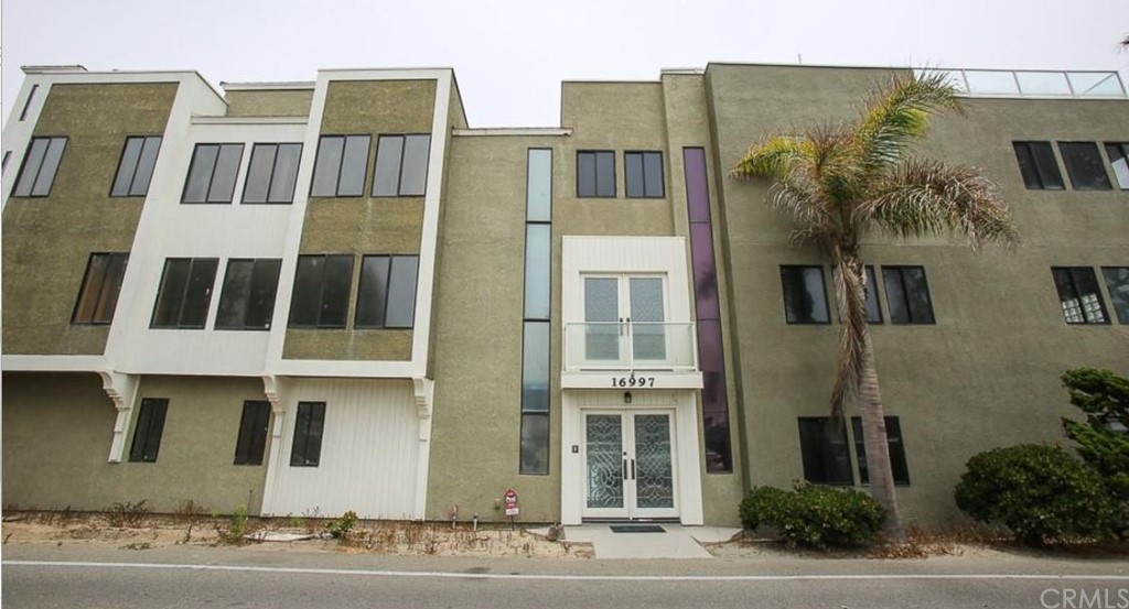 a view of a building with a street