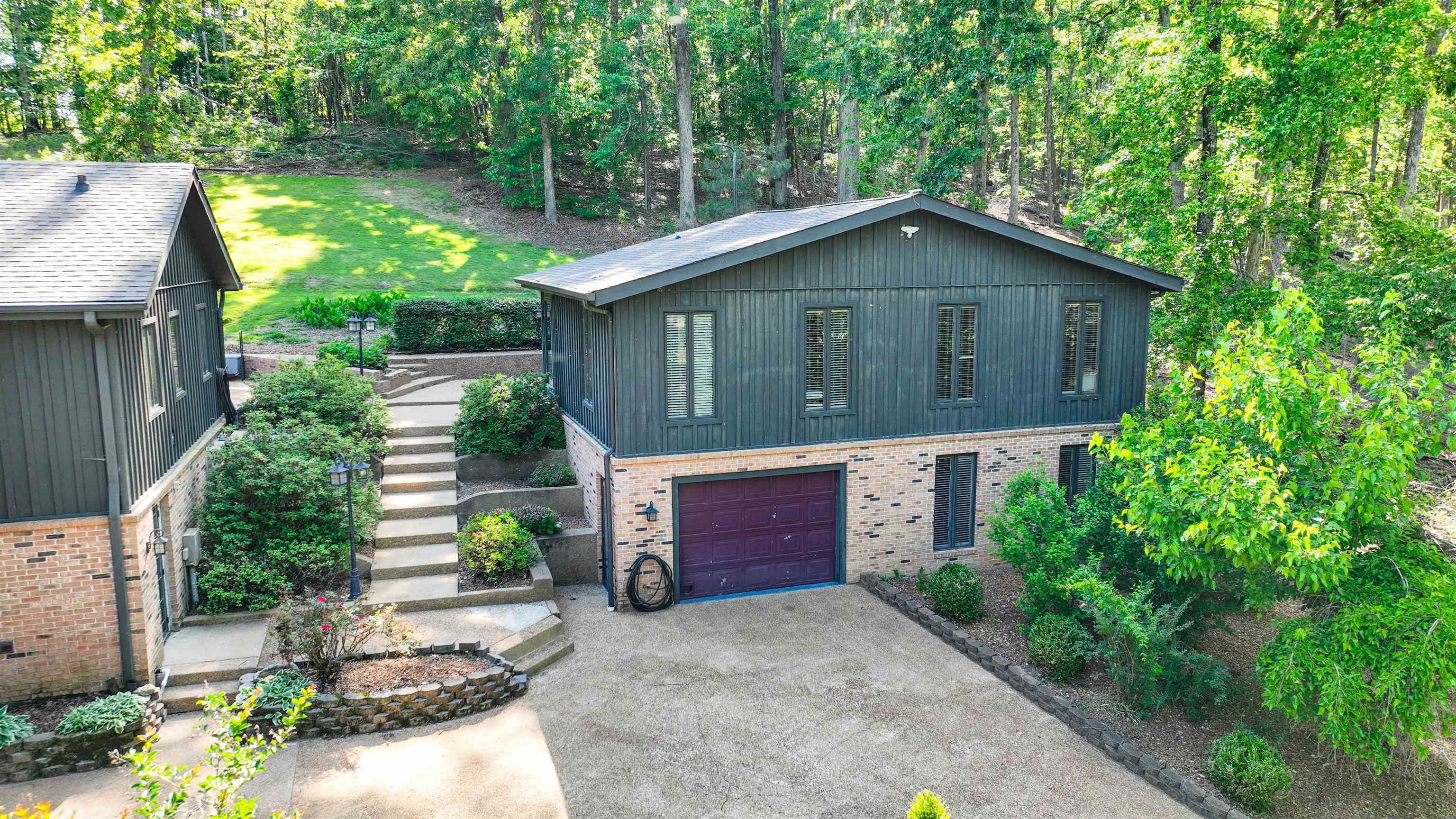 650 Caney Hollow Road Counce, TN 38326 - Photo 31 of 40 a front view of a house with a yard and trees