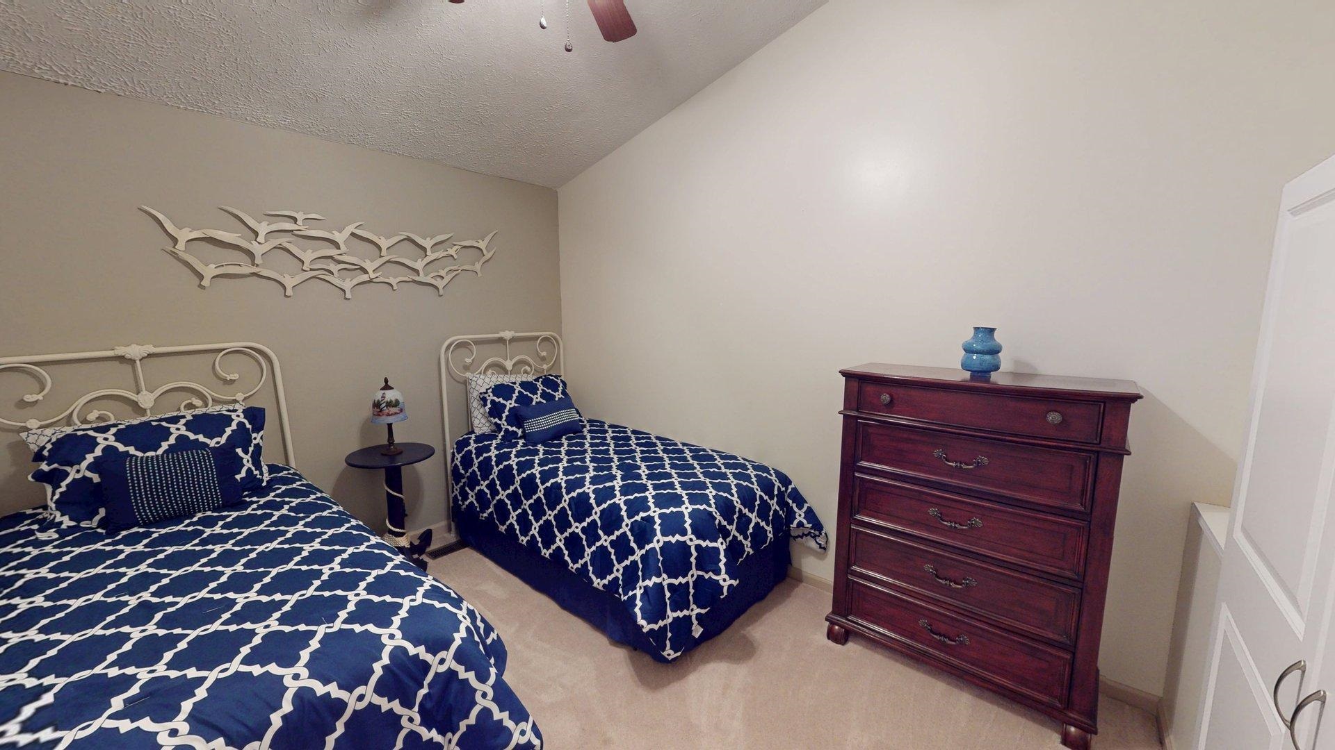 650 Caney Hollow Road Counce, TN 38326 - Photo 36 of 40 a bedroom with double bed and a dresser