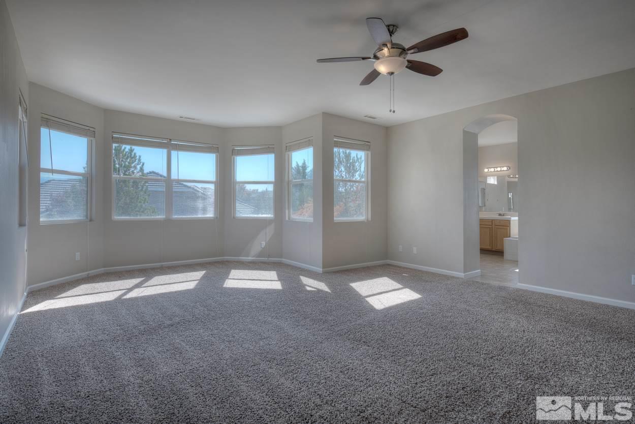 1580 Sutterbrook Way Reno, NV 89521 - Photo 13 of 25 a view of an empty room with a window