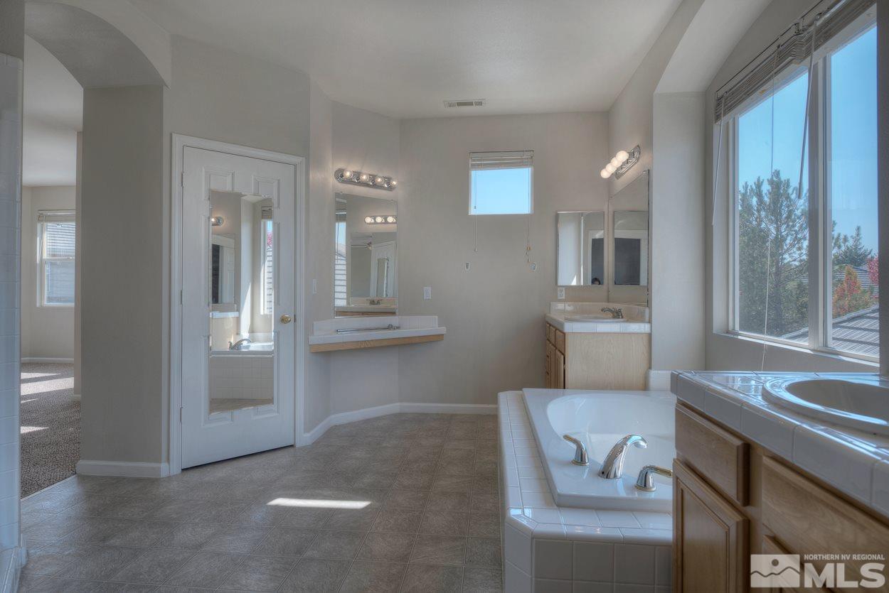 1580 Sutterbrook Way Reno, NV 89521 - Photo 15 of 25 a living room with a toilet