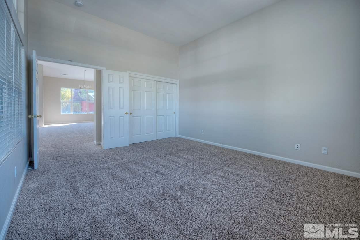 1580 Sutterbrook Way Reno, NV 89521 - Photo 20 of 25 a view of a big room with closet and windows