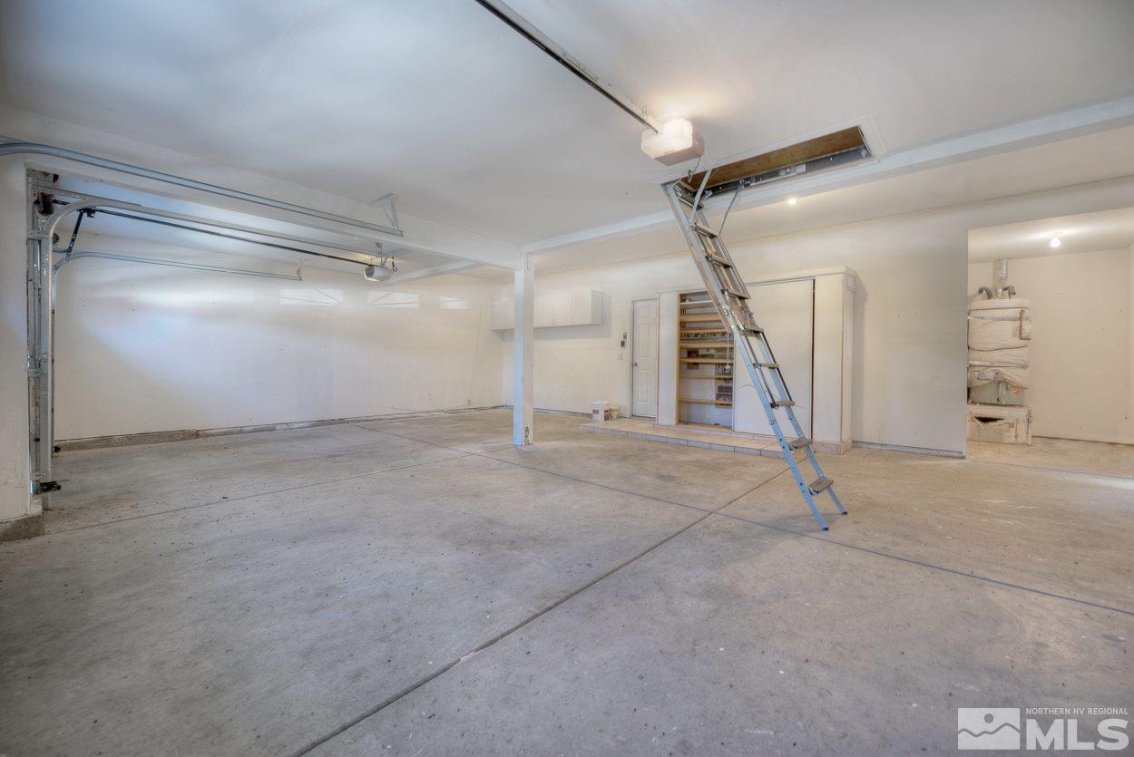 1580 Sutterbrook Way Reno, NV 89521 - Photo 22 of 25 a view of a room with wooden floor
