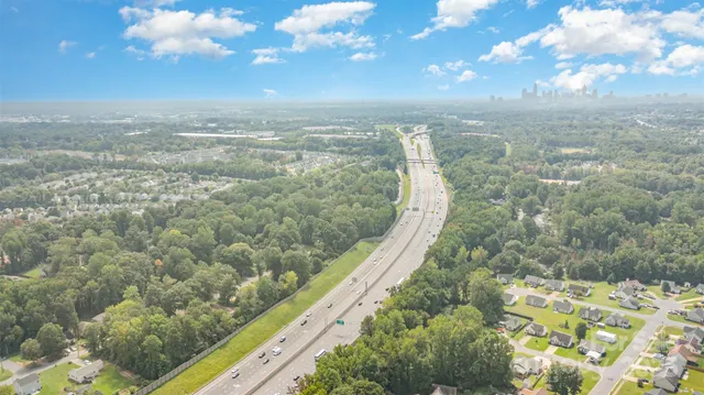 a view of a city with an ocean view