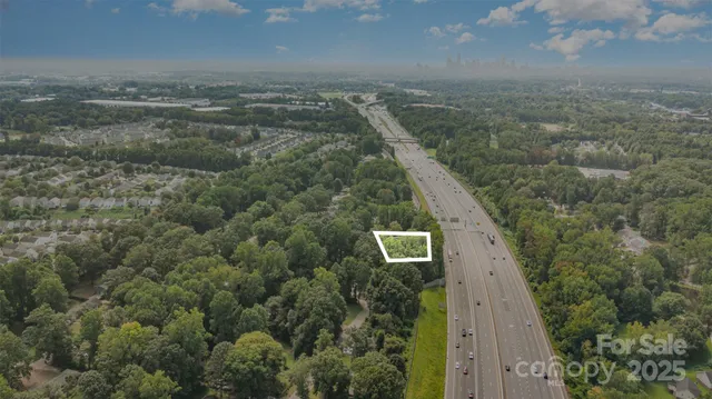 an aerial view of house with yard