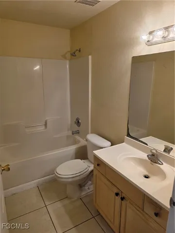 an empty room with a empty space and a window