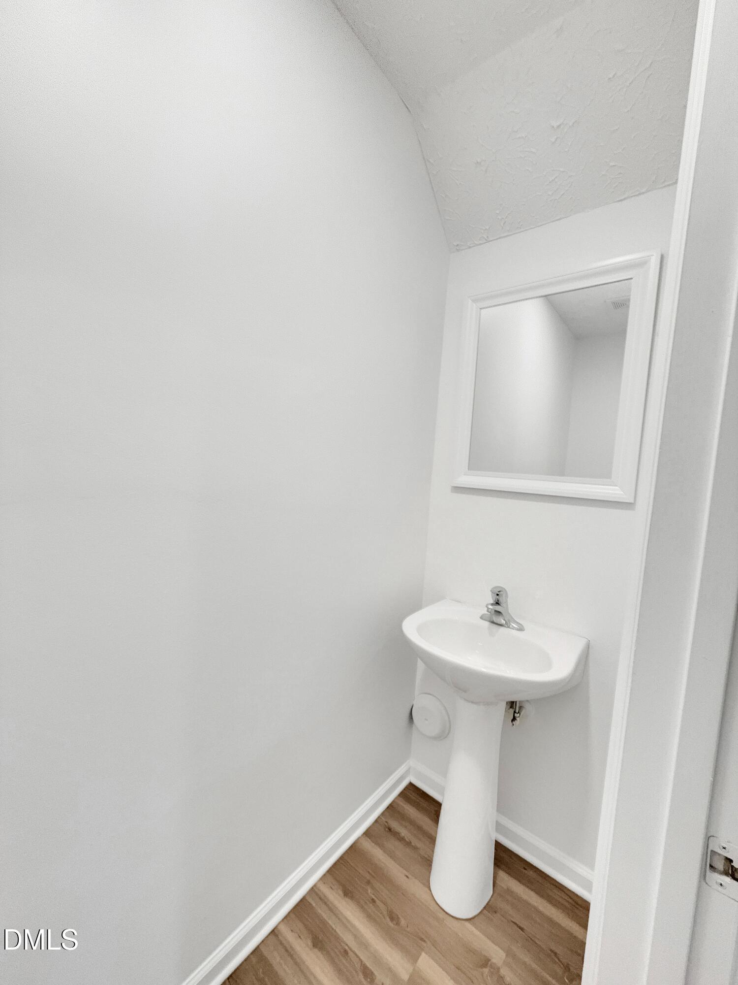2816 Smoke Place Raleigh, NC 27610 - Photo 10 of 21 a bathroom with a sink toilet