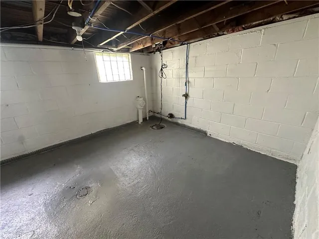 a view of a room with a large window