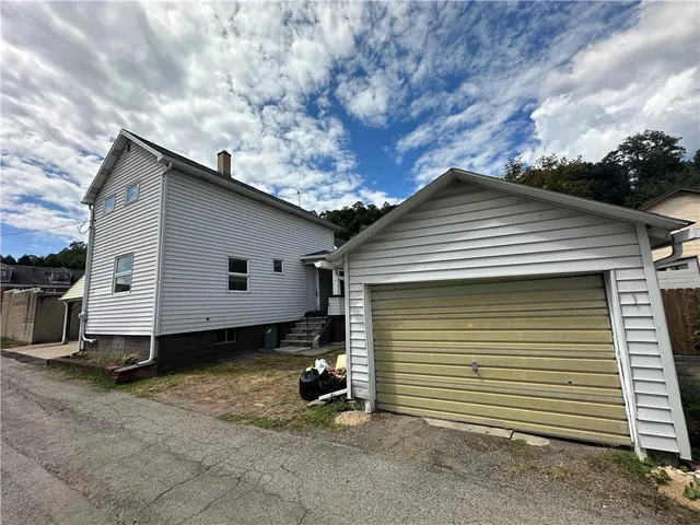 a view of a building with a street