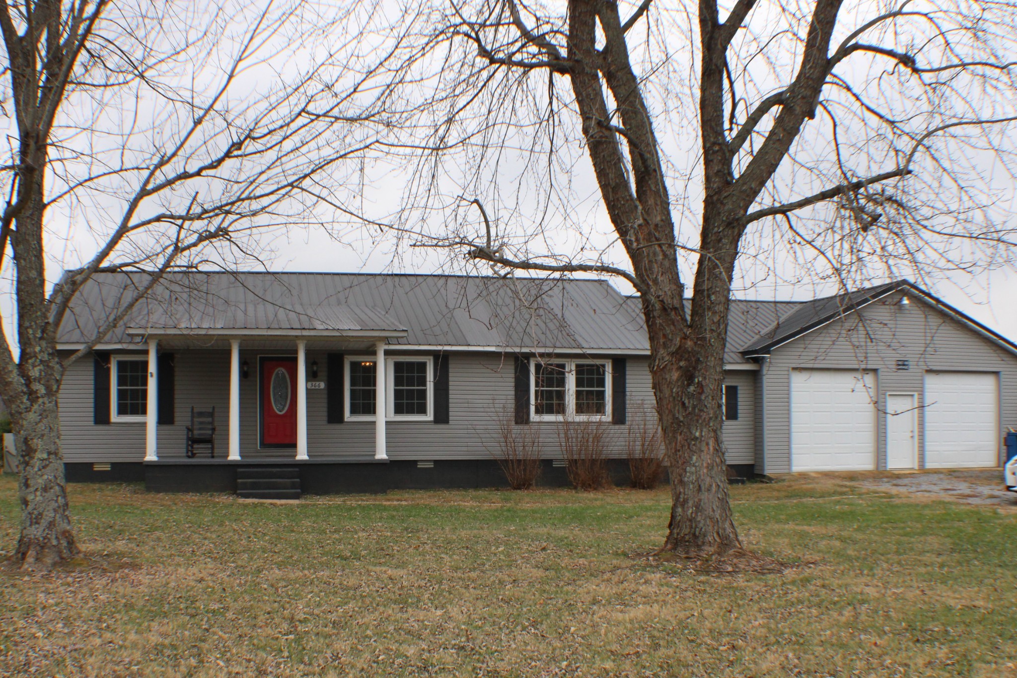 366 Pea Ridge Road Woodbury, TN 37190 - Photo 1 of 25 front view of house with a yard