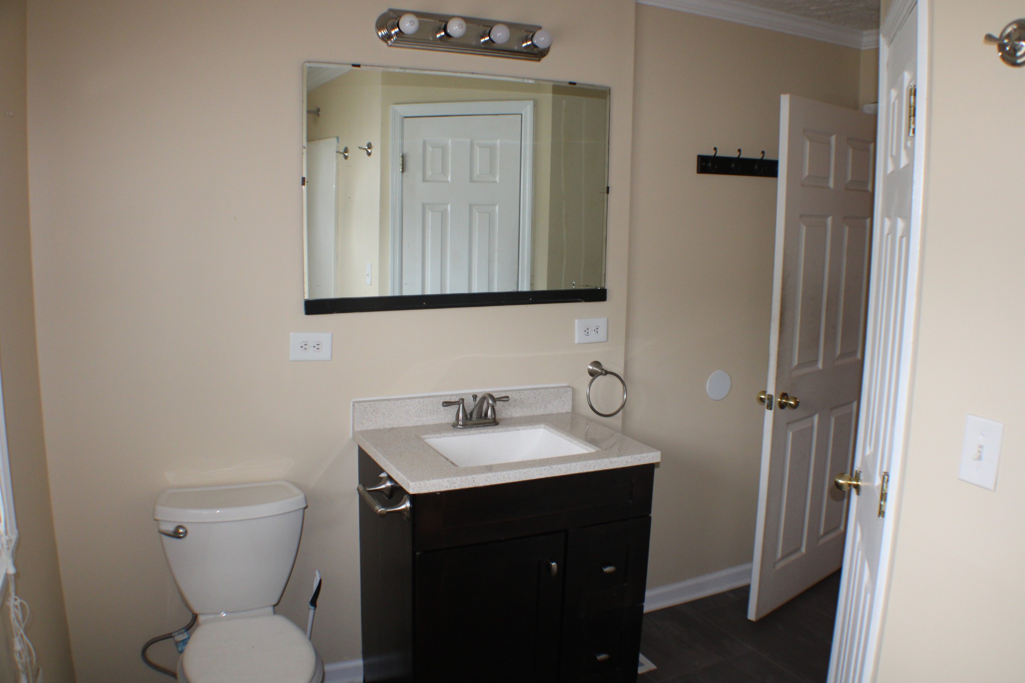 366 Pea Ridge Road Woodbury, TN 37190 - Photo 12 of 25 a bathroom with a toilet sink and mirror