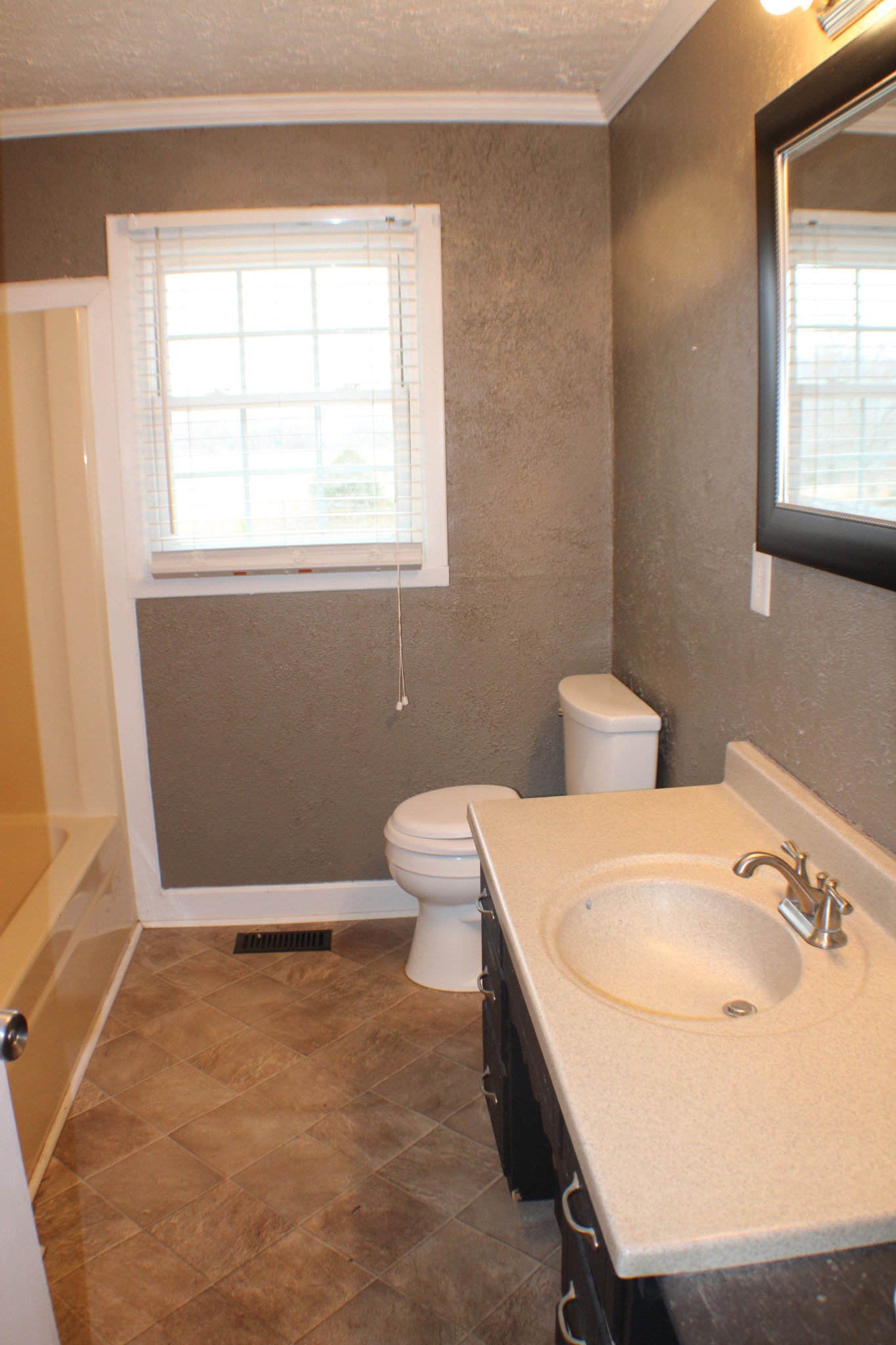 366 Pea Ridge Road Woodbury, TN 37190 - Photo 15 of 25 a bathroom with a sink toilet and window
