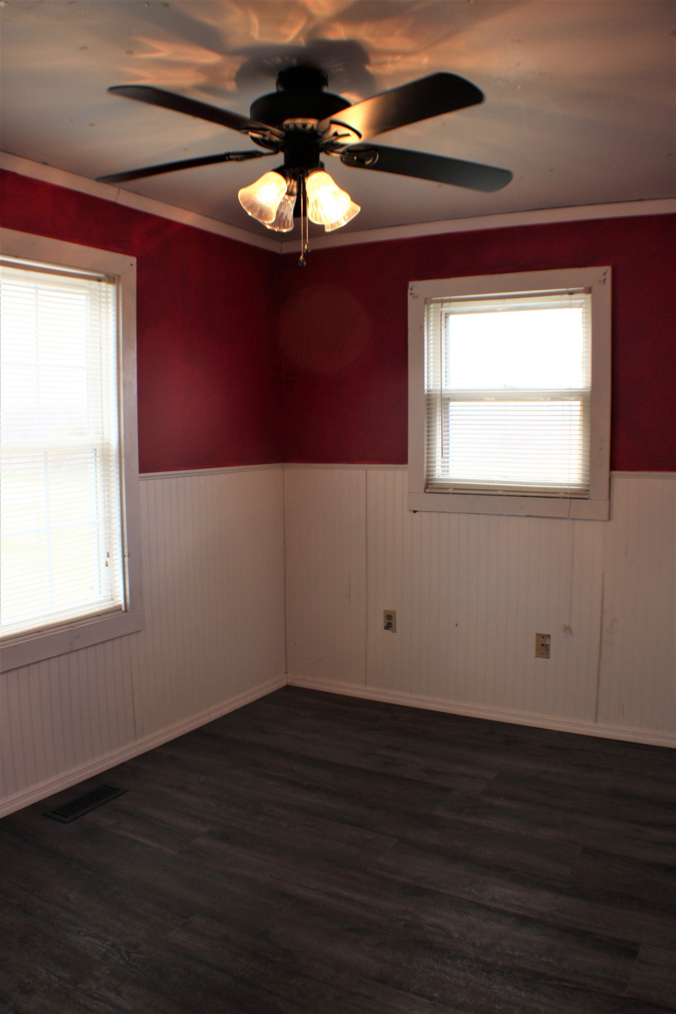 366 Pea Ridge Road Woodbury, TN 37190 - Photo 16 of 25 a view of an empty room with wooden floor and a window