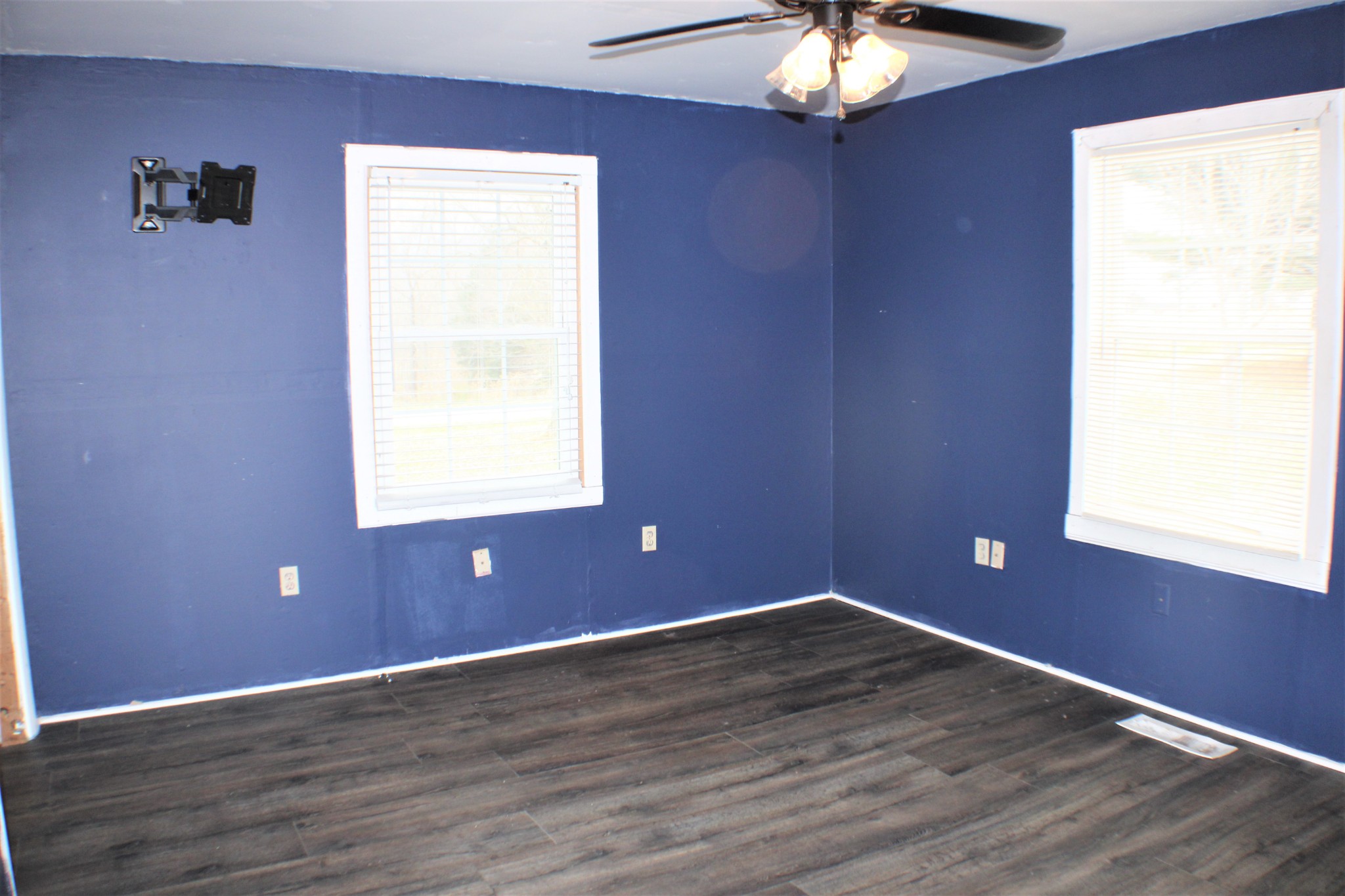 366 Pea Ridge Road Woodbury, TN 37190 - Photo 17 of 25 a view of empty room with window and wooden floor