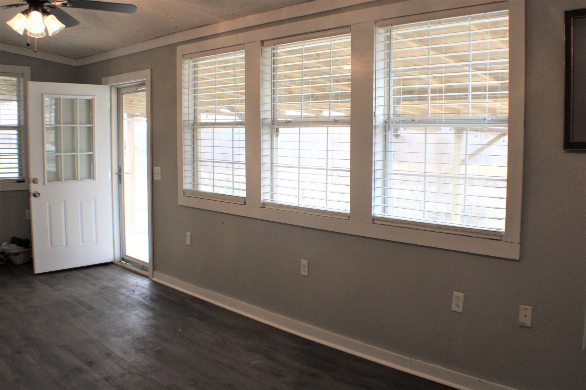 366 Pea Ridge Road Woodbury, TN 37190 - Photo 18 of 25 a view of an empty room with wooden floor and a window