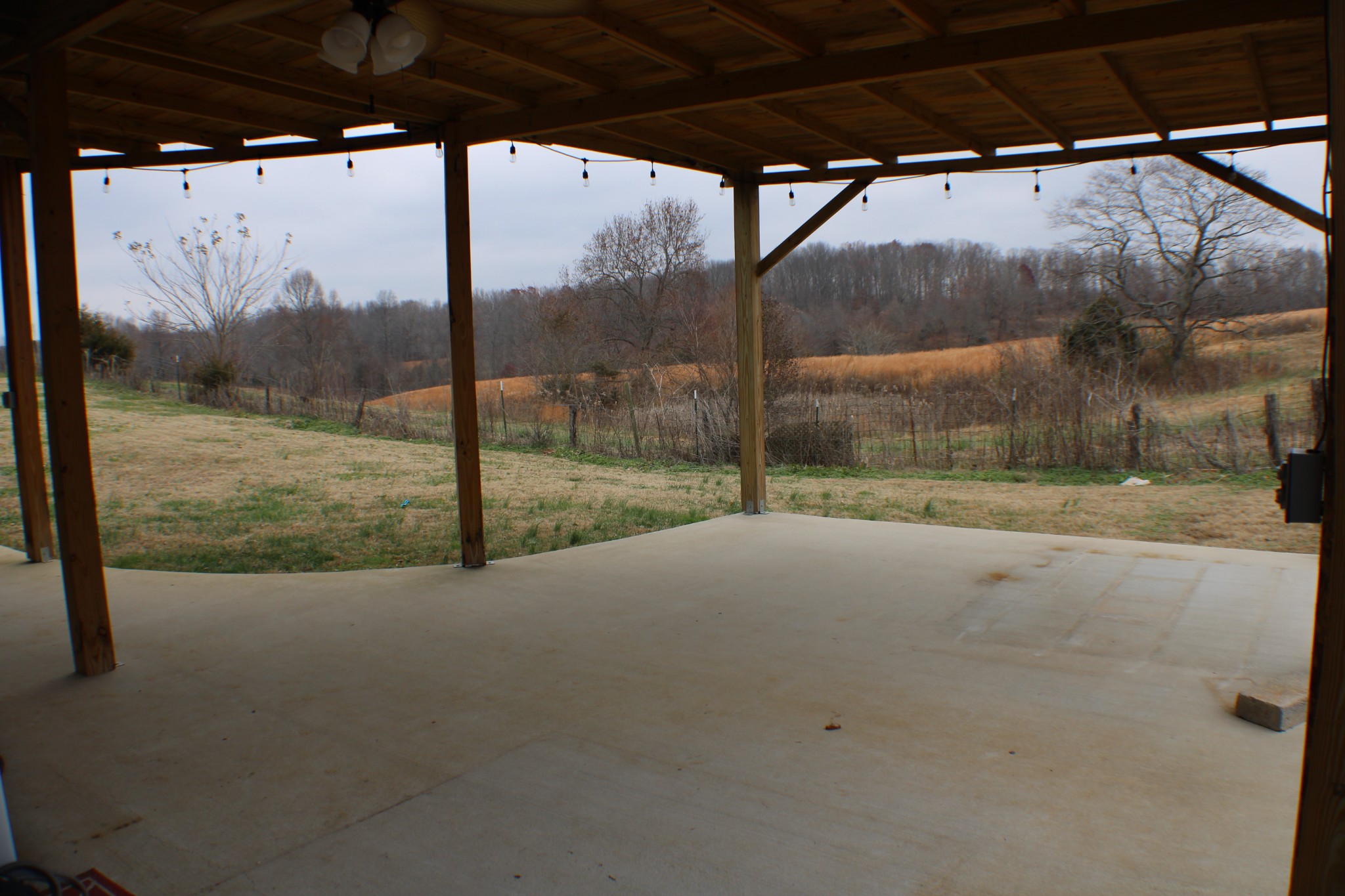 366 Pea Ridge Road Woodbury, TN 37190 - Photo 21 of 25 a view of a room with a car parked