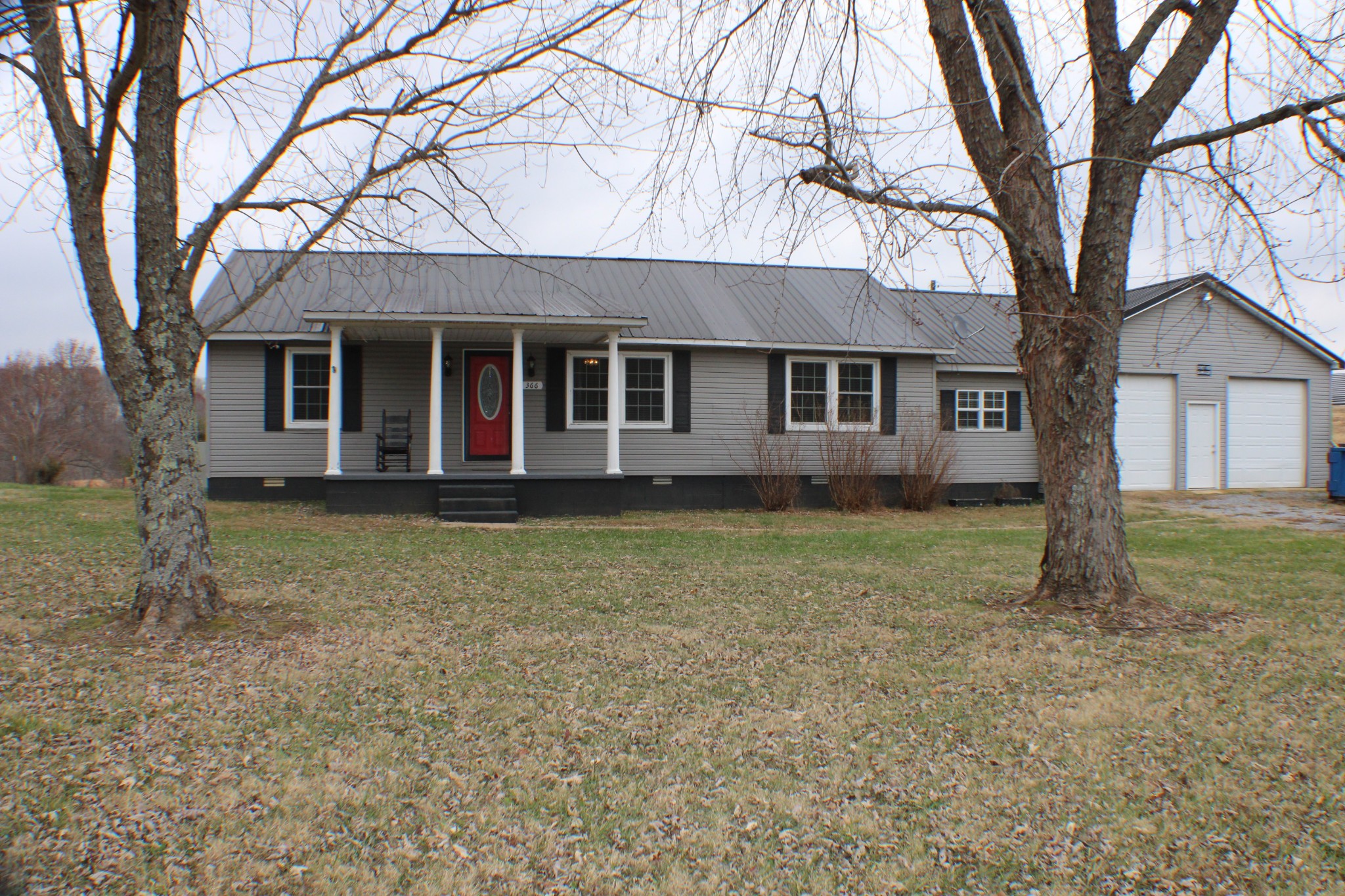 366 Pea Ridge Road Woodbury, TN 37190 - Photo 24 of 25 front view of a house with a yard