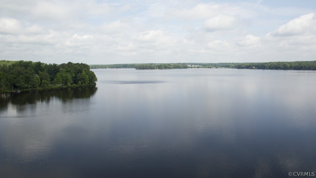 5210 Clipper Cove Road Midlothian, VA 23112 - Photo 23 of 24 a view of a lake with a city