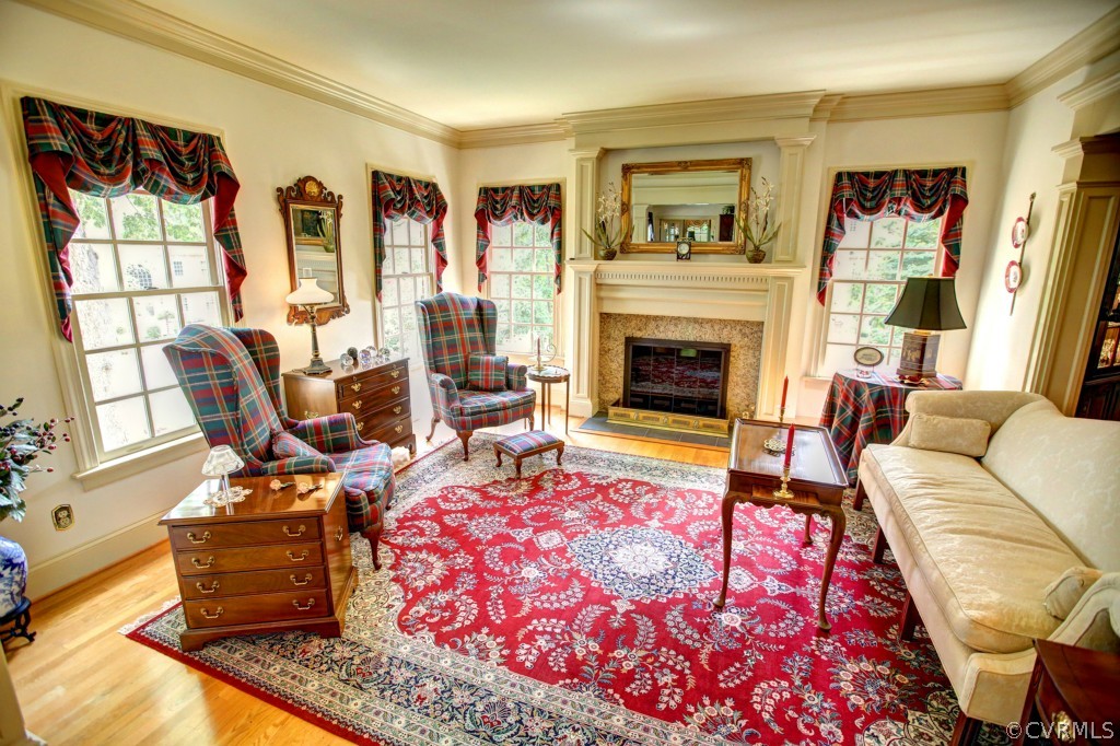 5210 Clipper Cove Road Midlothian, VA 23112 - Photo 4 of 24 a living room with furniture fireplace and flat screen tv
