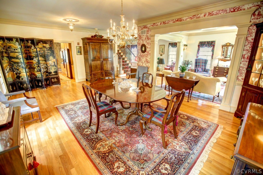 5210 Clipper Cove Road Midlothian, VA 23112 - Photo 7 of 24 a view of a dining room with furniture and wooden floor
