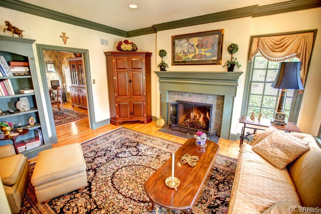 5210 Clipper Cove Road Midlothian, VA 23112 - Photo 9 of 24 a living room with furniture and a fireplace