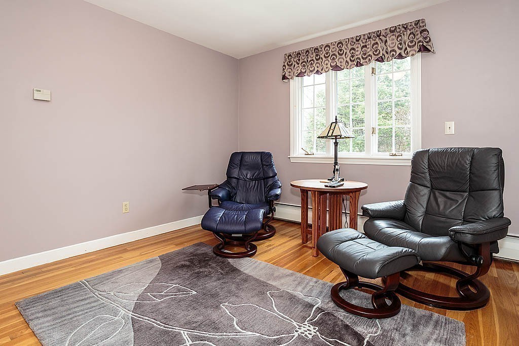 959 Brook Road Milton, MA 02186 - Photo 22 of 30 a living room with furniture and a window