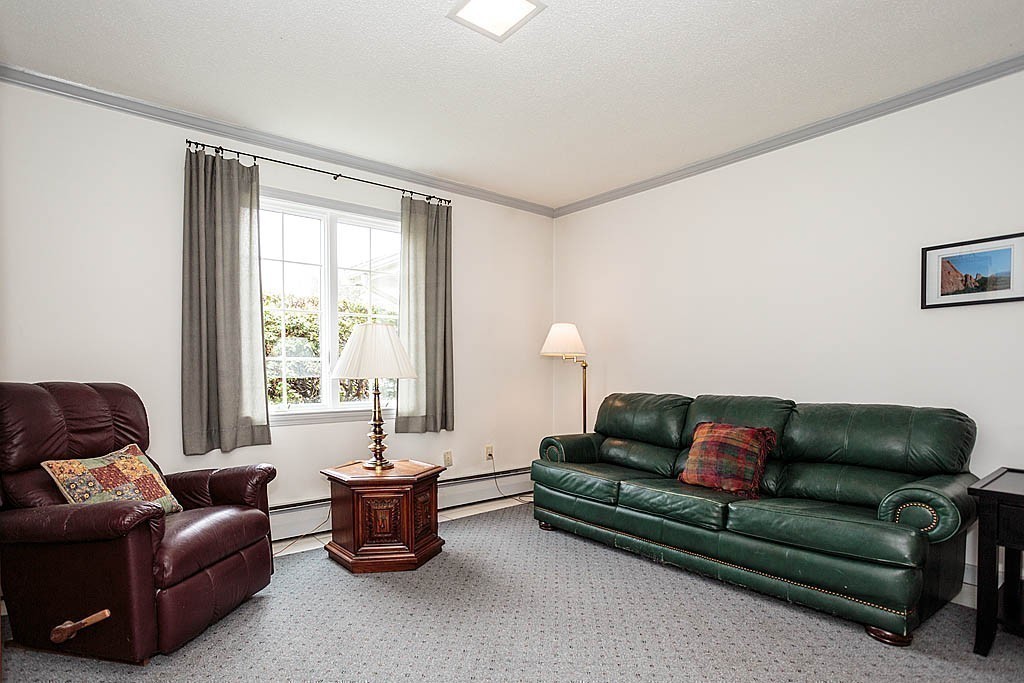 959 Brook Road Milton, MA 02186 - Photo 28 of 30 a living room with furniture and a large window