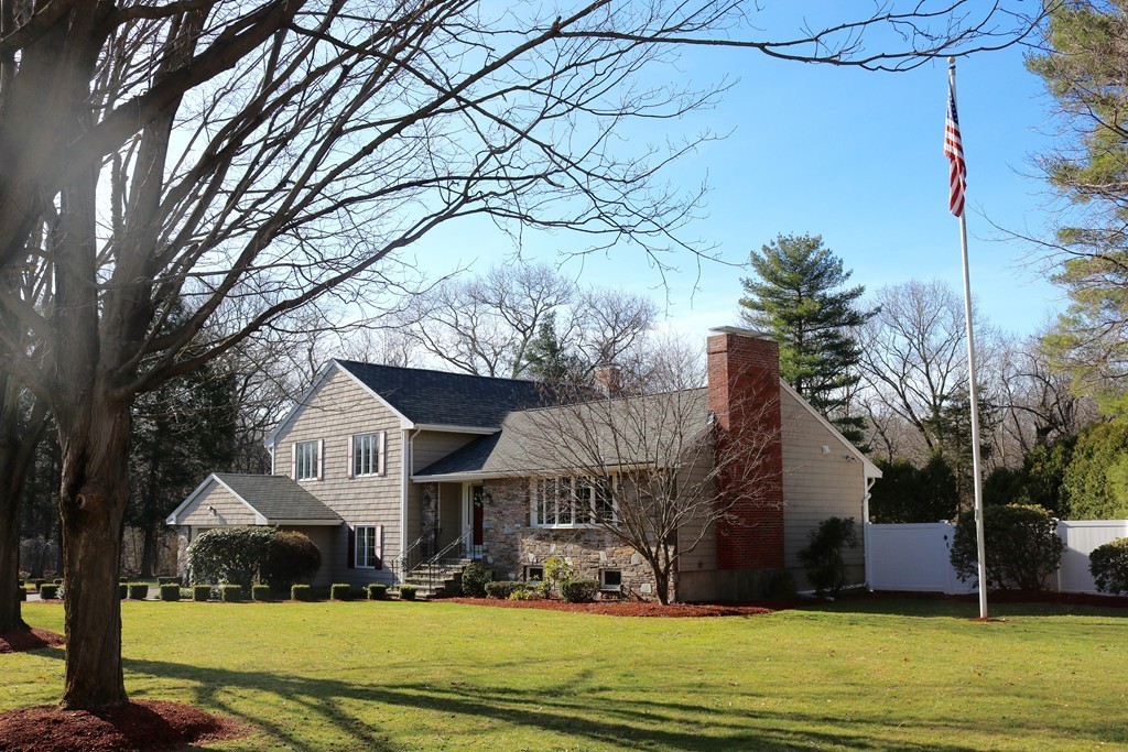 959 Brook Road Milton, MA 02186 - Photo 3 of 30 a front view of a house with a yard