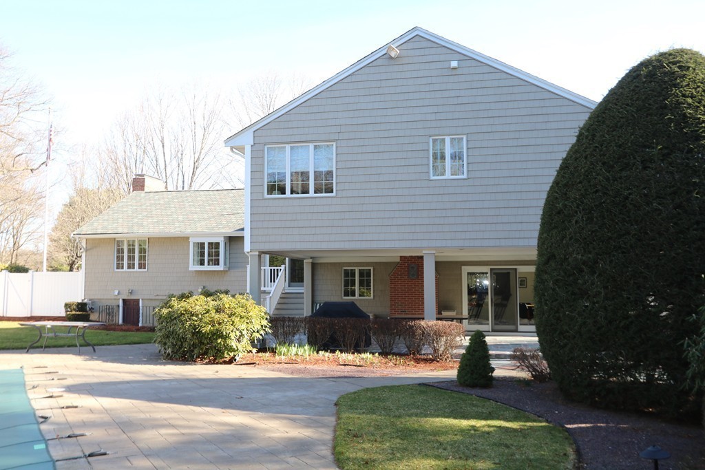 959 Brook Road Milton, MA 02186 - Photo 6 of 30 a front view of a house with a yard