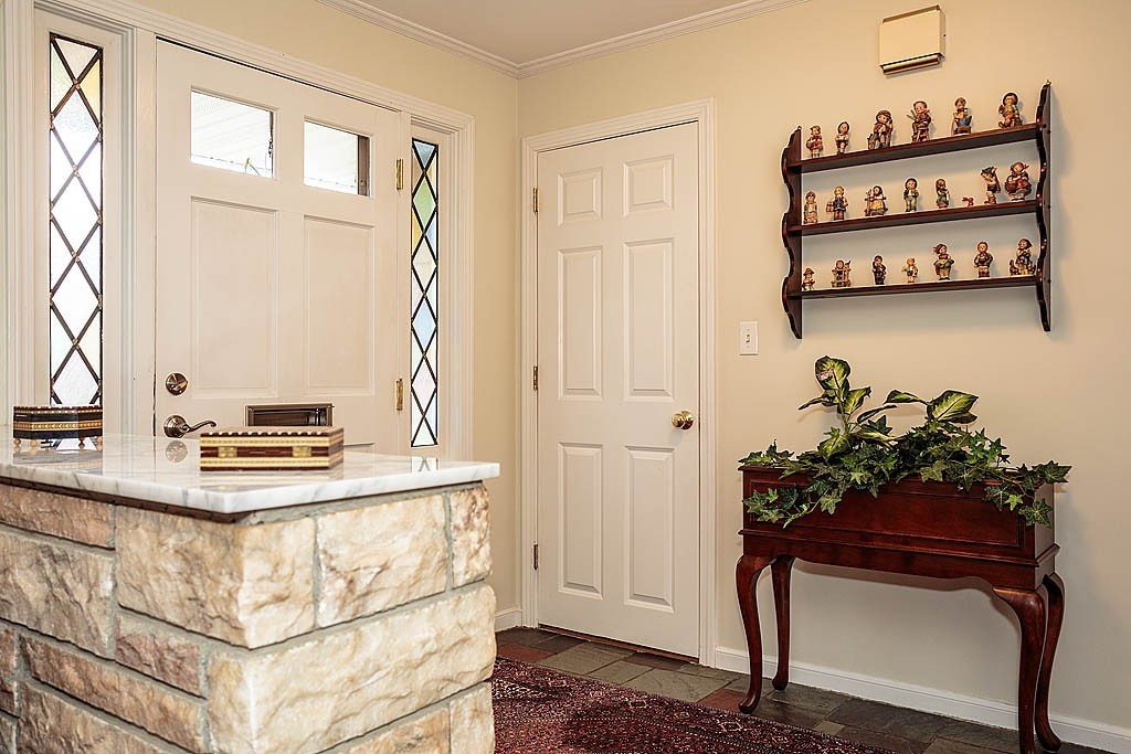 959 Brook Road Milton, MA 02186 - Photo 9 of 30 a view of a hallway with seating area