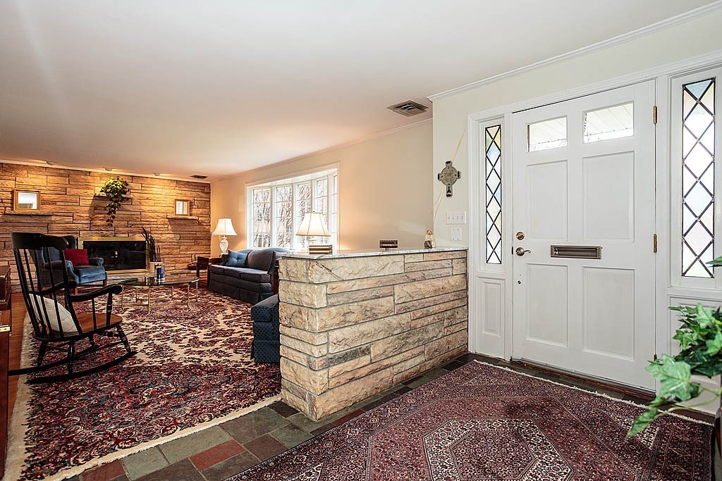 959 Brook Road Milton, MA 02186 - Photo 10 of 30 a view of a livingroom with furniture and window