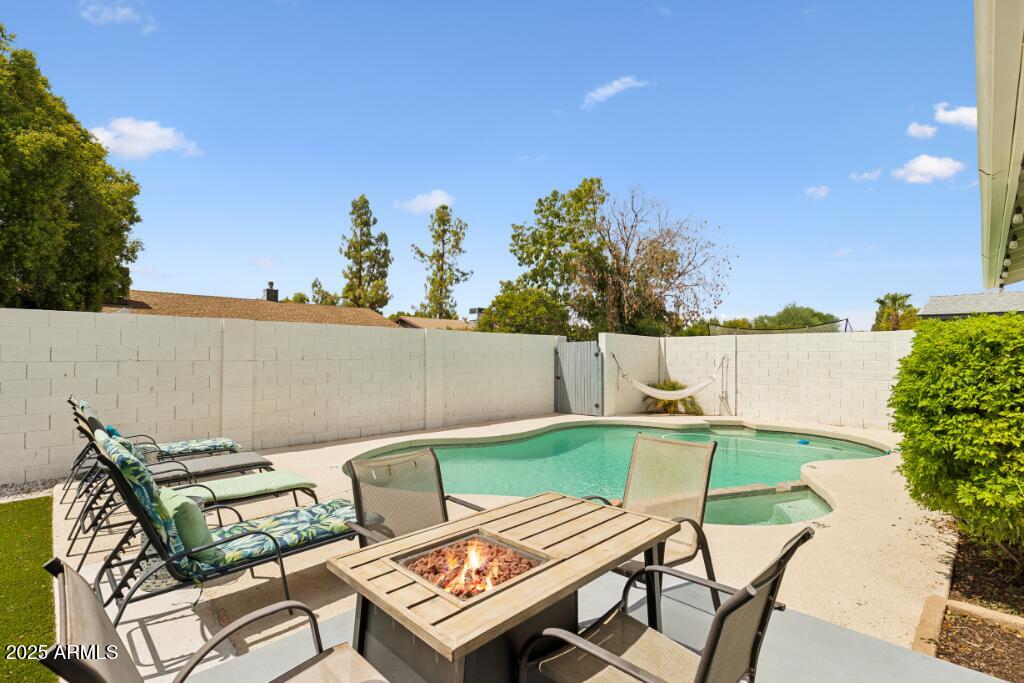 2163 East Sesame Street Tempe, AZ 85283 - Photo 14 of 16 a view of a chairs and table on the terrace