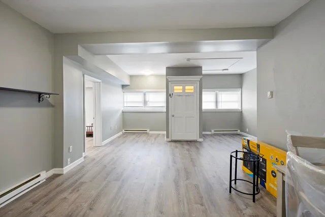 wooden floor and windows in an empty room