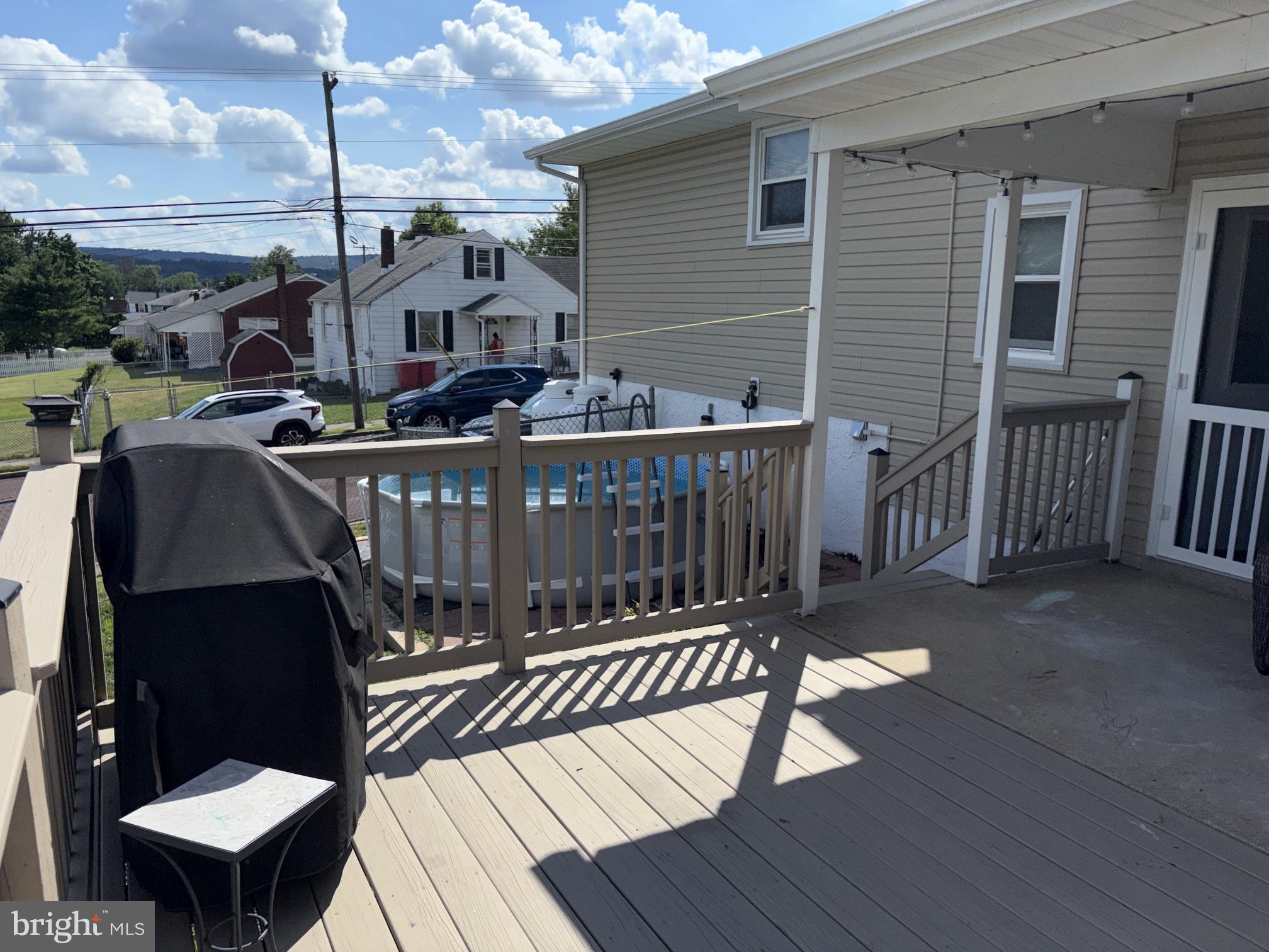 402 Grosstown Road Stowe, PA 19464 - Photo 34 of 37 Sunny deck with poolside views.