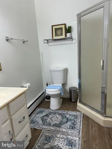 a close view of a utility room with washer and dryer