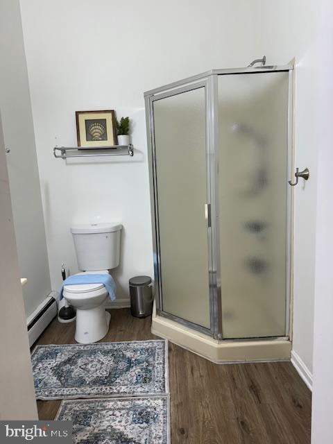 1110 South Potomac Street Baltimore, MD 21224 - Photo 19 of 22 a bathroom with a toilet and a shower