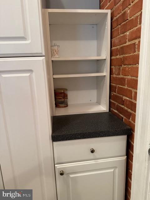 1110 South Potomac Street Baltimore, MD 21224 - Photo 20 of 22 a close view of a utility room with washer and dryer