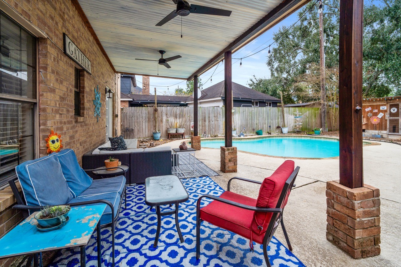 1102 Sherfield Ridge Drive Katy, TX 77450 - Photo 34 of 39 a outdoor living space with furniture and garden view